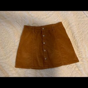 Brown courdory mini skirt with buttons